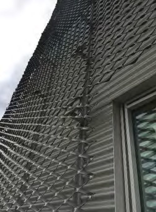 Building Close up with metal mesh