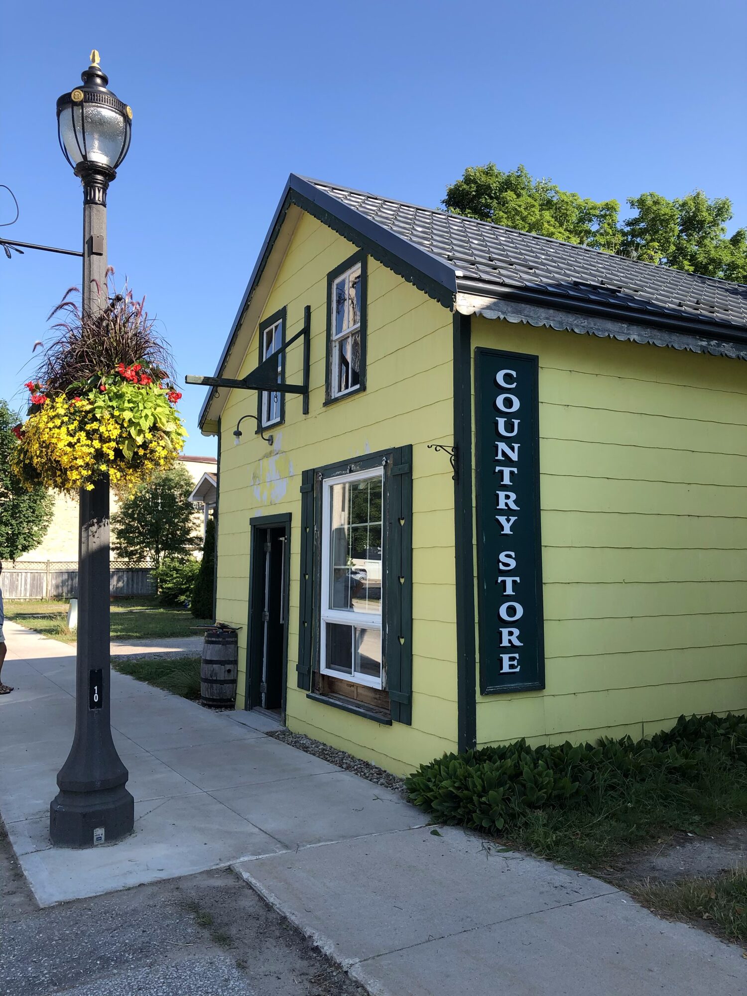 Yellow country store with steel roof