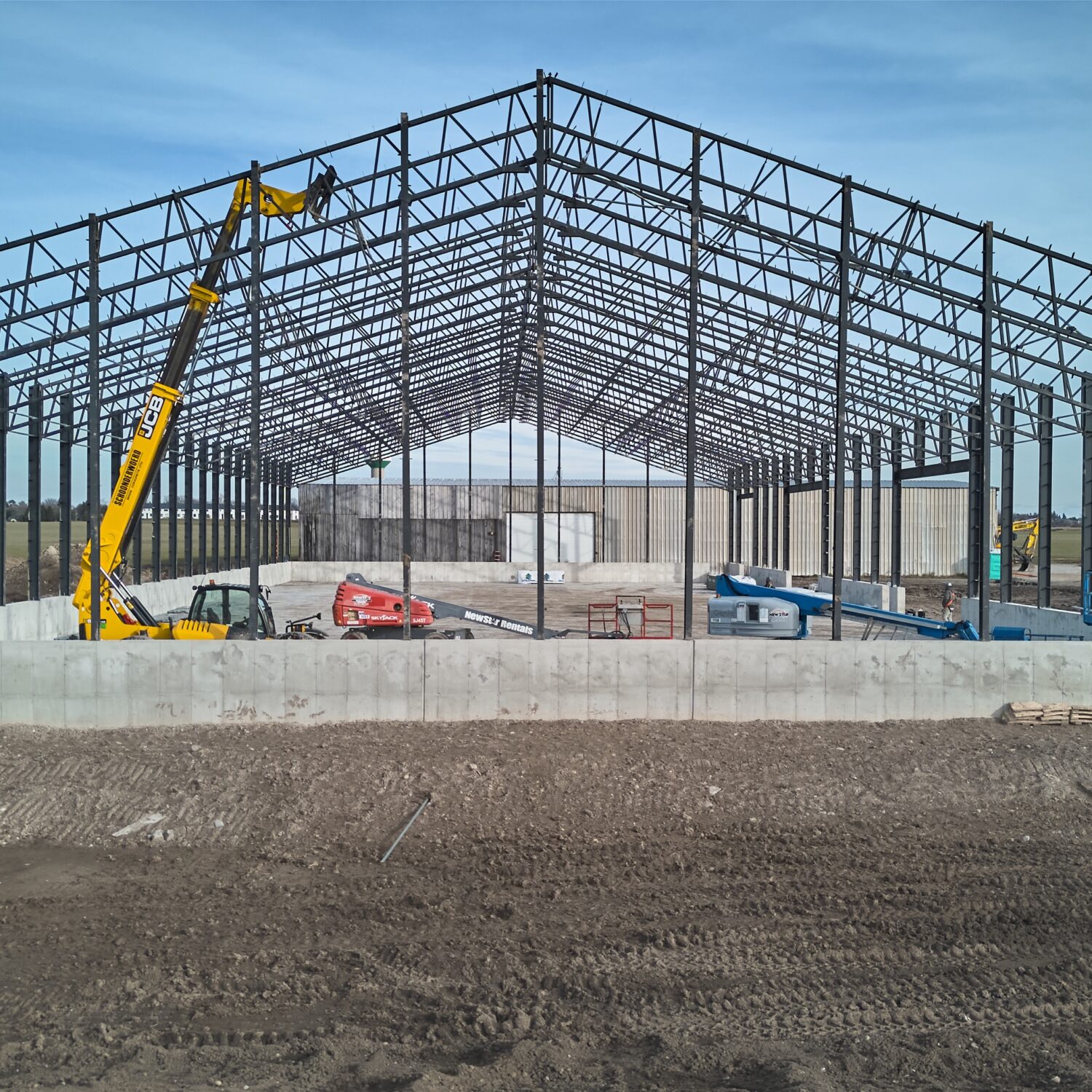 Front view of steel framing while barn is under construction