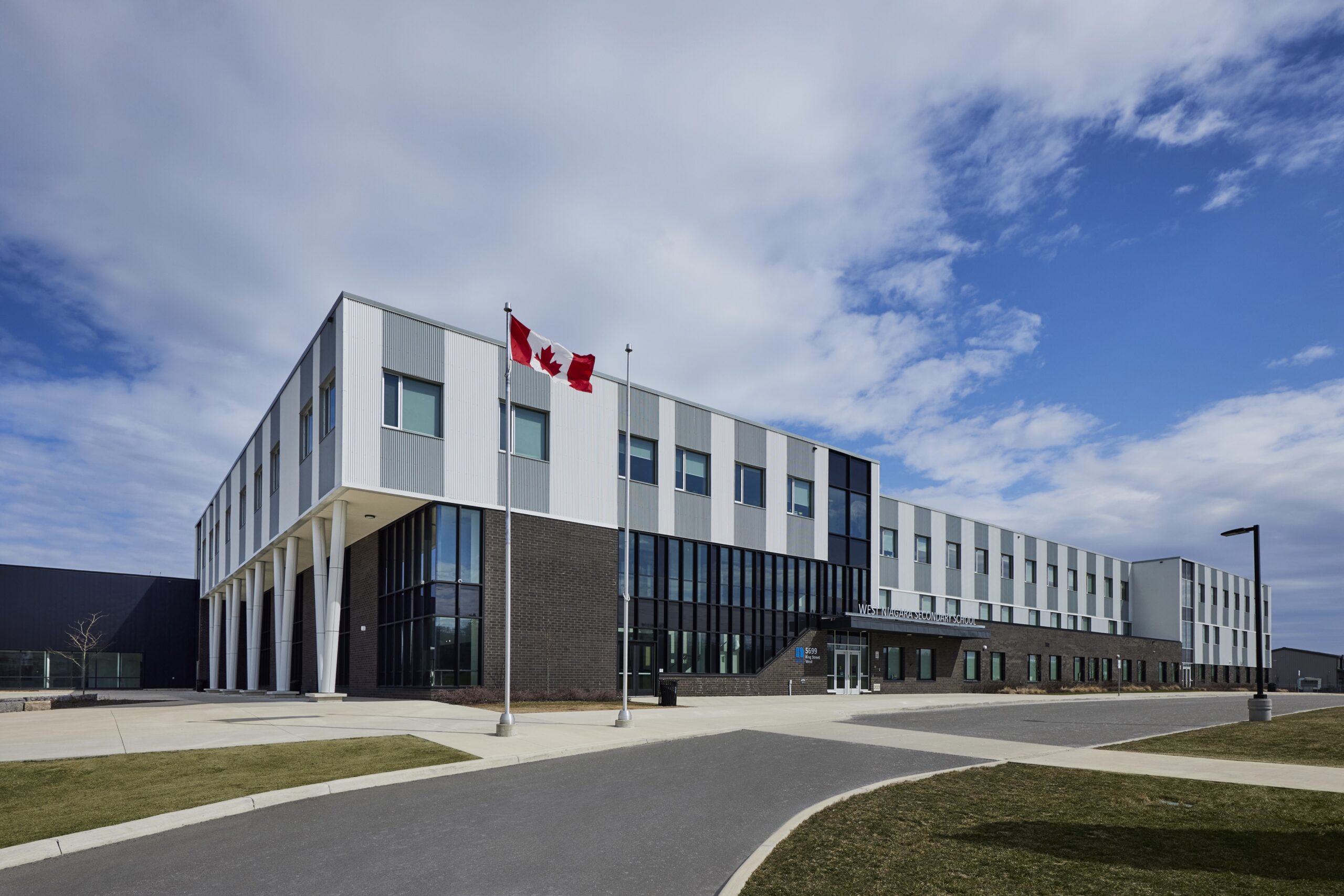 West Niagara Secondary School front entrance with Canadian flag
